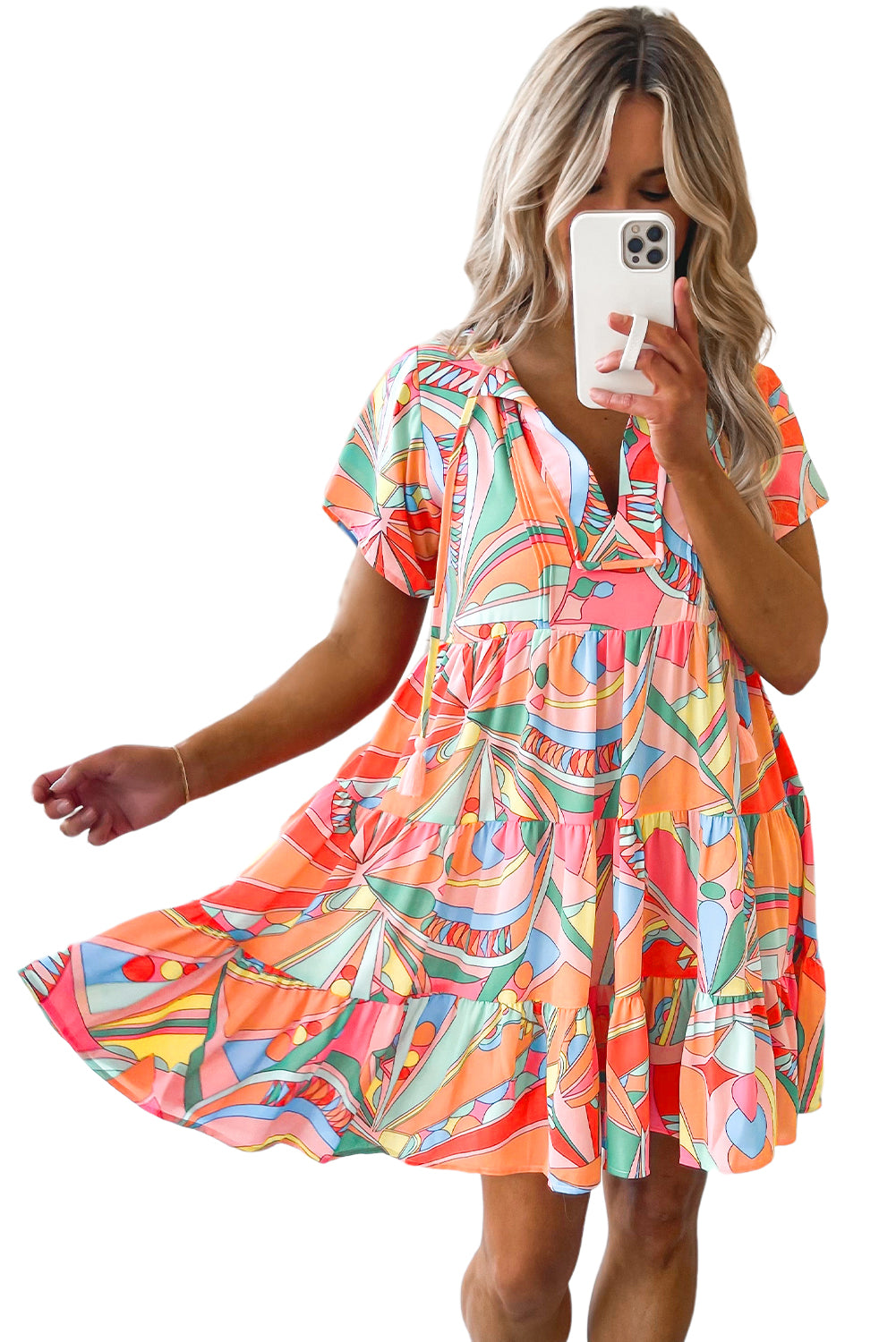 Mehrfarbiges, ausgestelltes Kleid mit abstraktem geometrischem Print und Quastenbindung