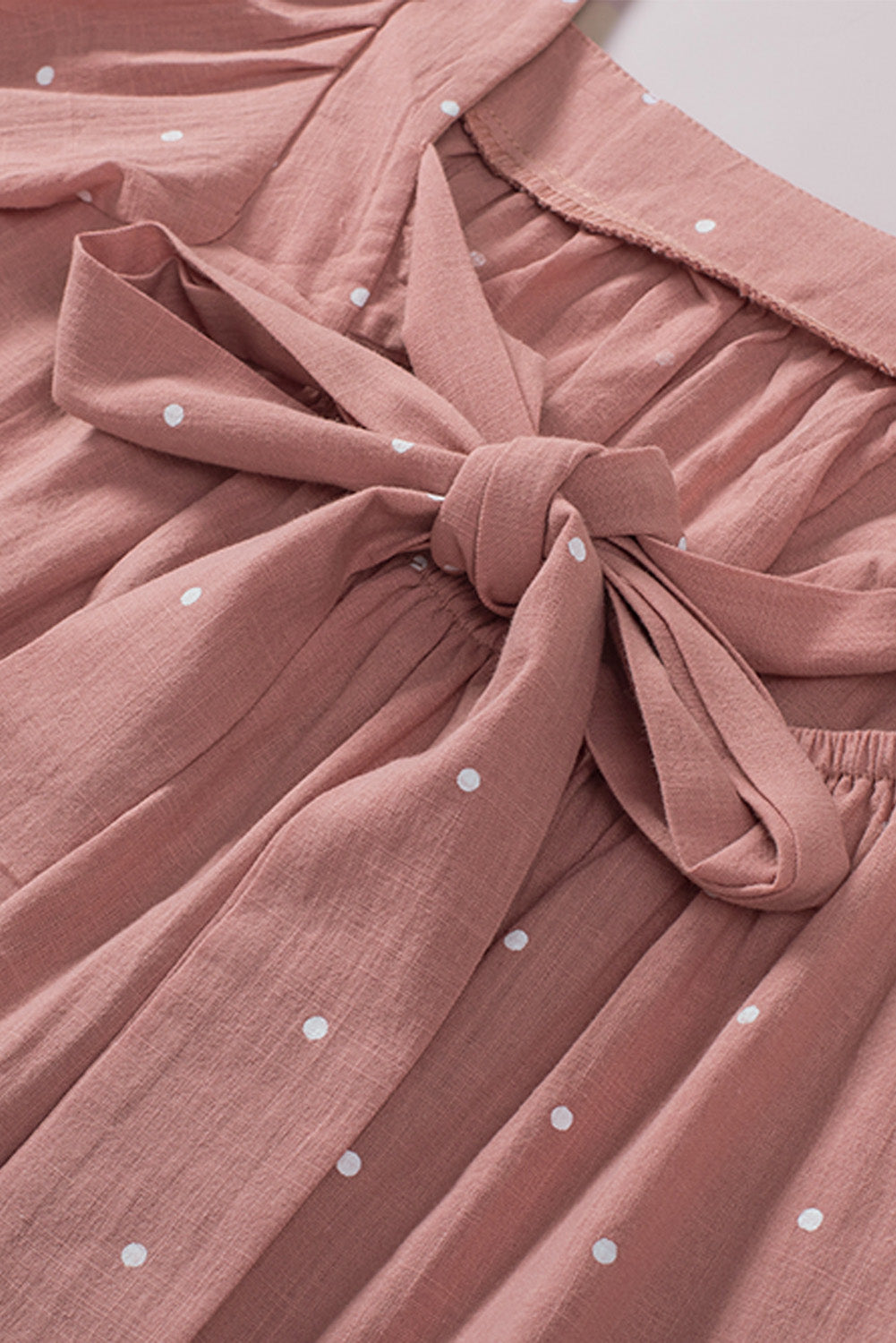 Rosafarbene Bluse mit eckigem Ausschnitt, gepunktetem Print, Puffärmeln und Raffung hinten