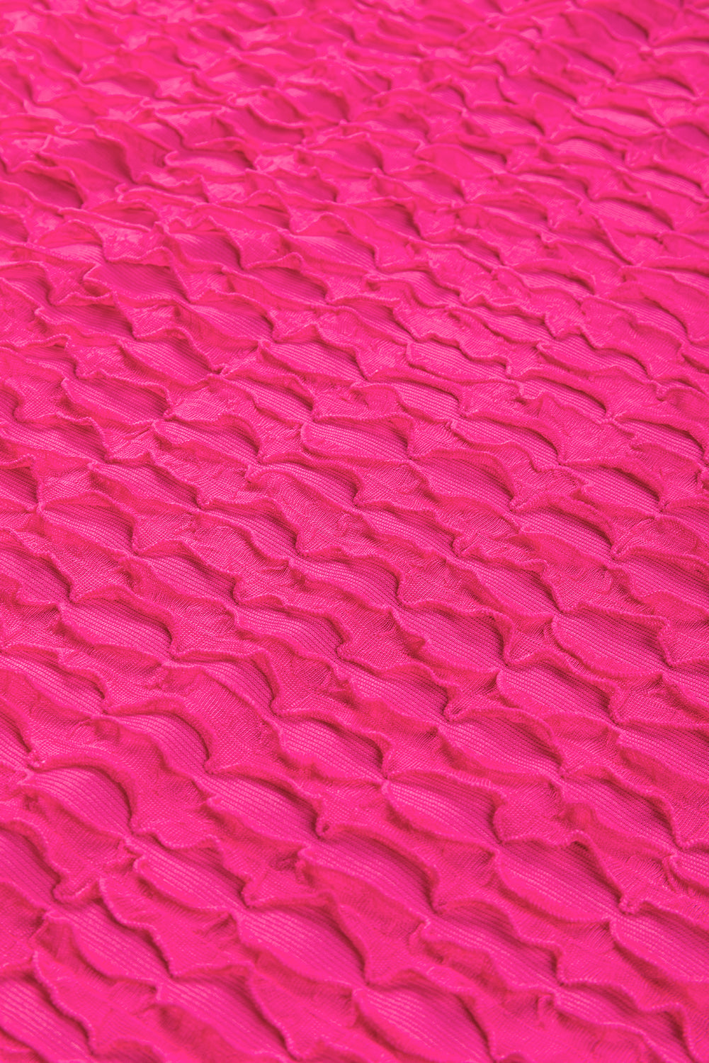 Rožnato rdeč ohlapen, teksturiran zgornji del s spuščenimi rameni z okroglim izrezom