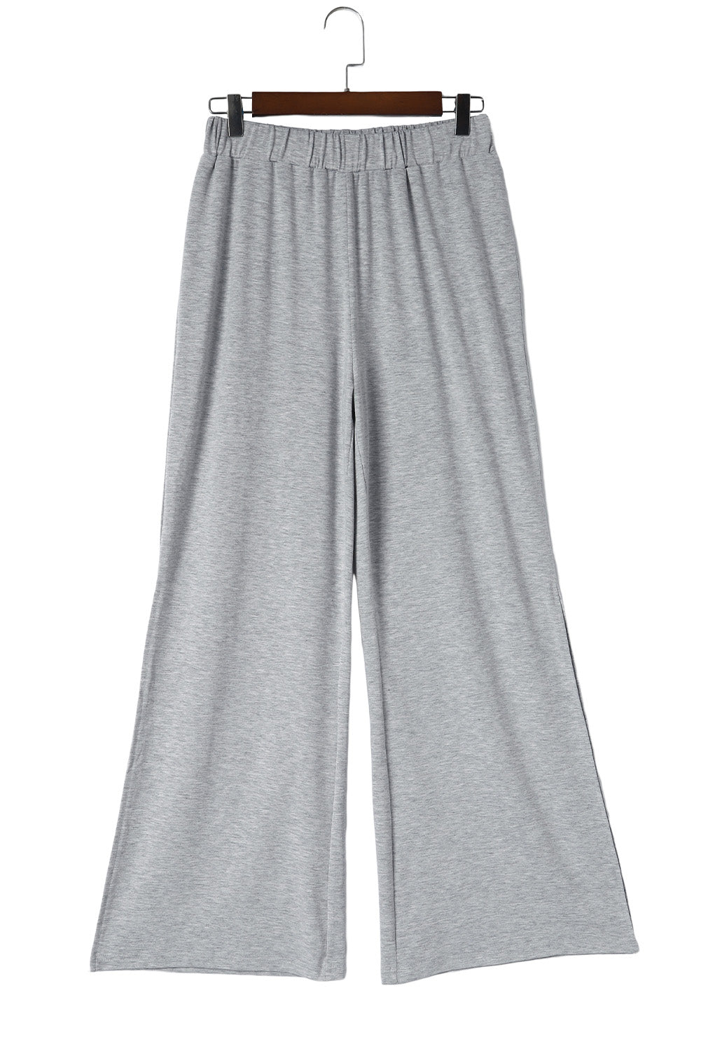 Sive hlače s bočnim prorezima širokih nogavica i visokog struka