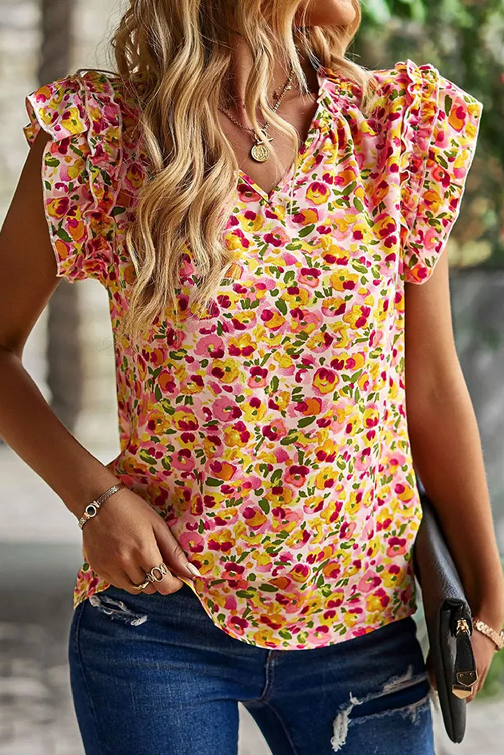 Rumena majica brez rokavov s cvetličnim potiskom in v-izrezom