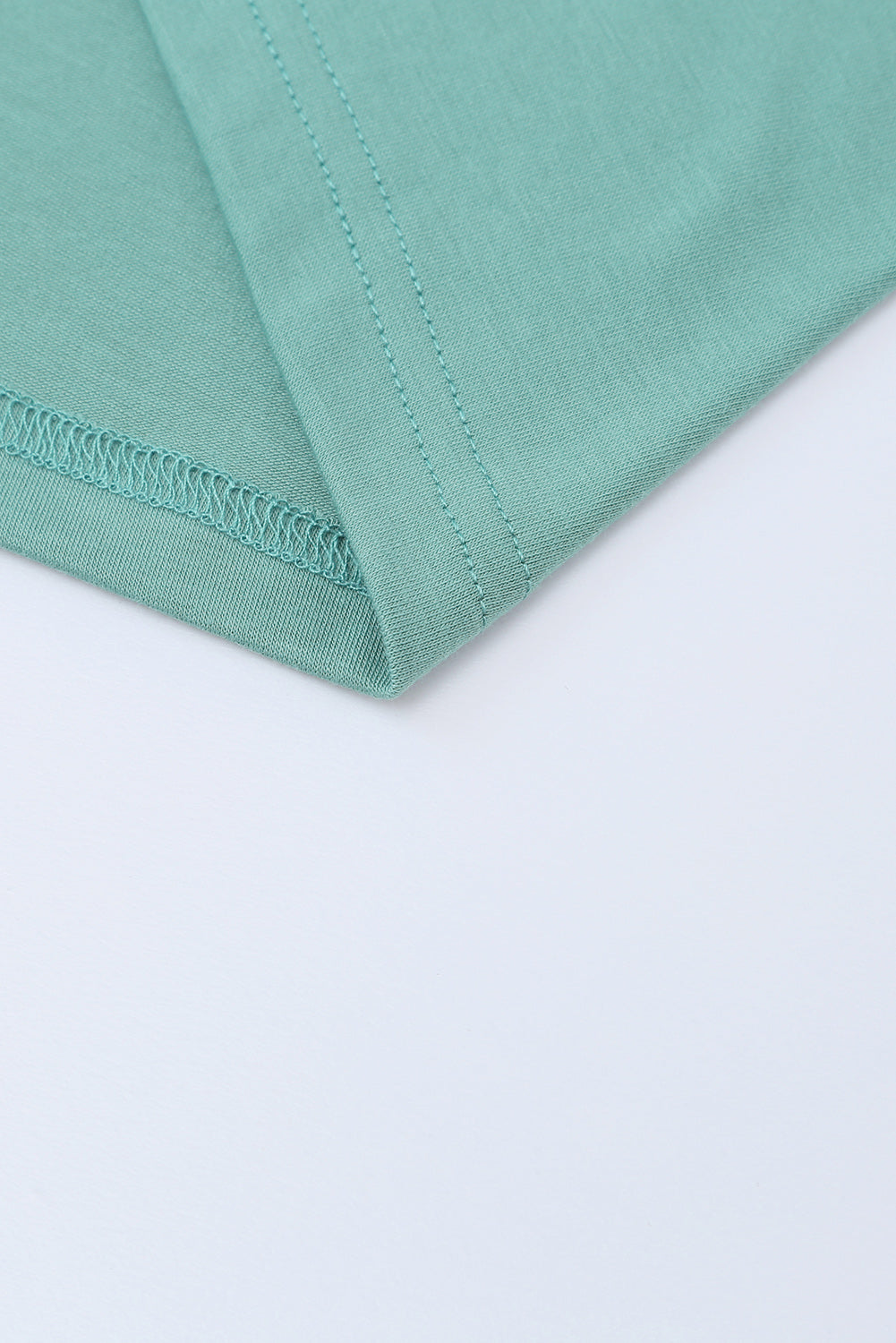 Svijetlozeleni gornji dio tunike s bočnim džepovima kratkih rukava