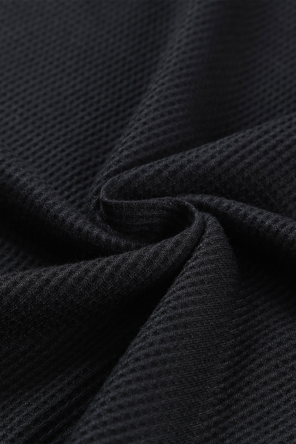 Haut noir à manches volantées et imprimé animal en tricot gaufré de grande taille