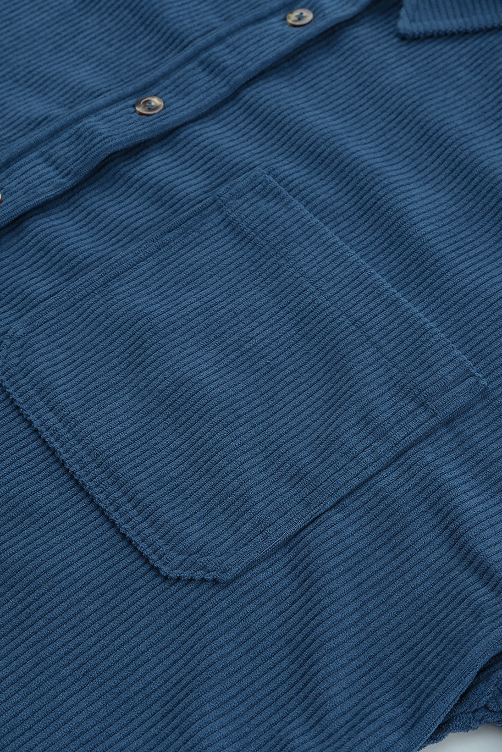 Chemise bleue à poche boutonnée en velours côtelé