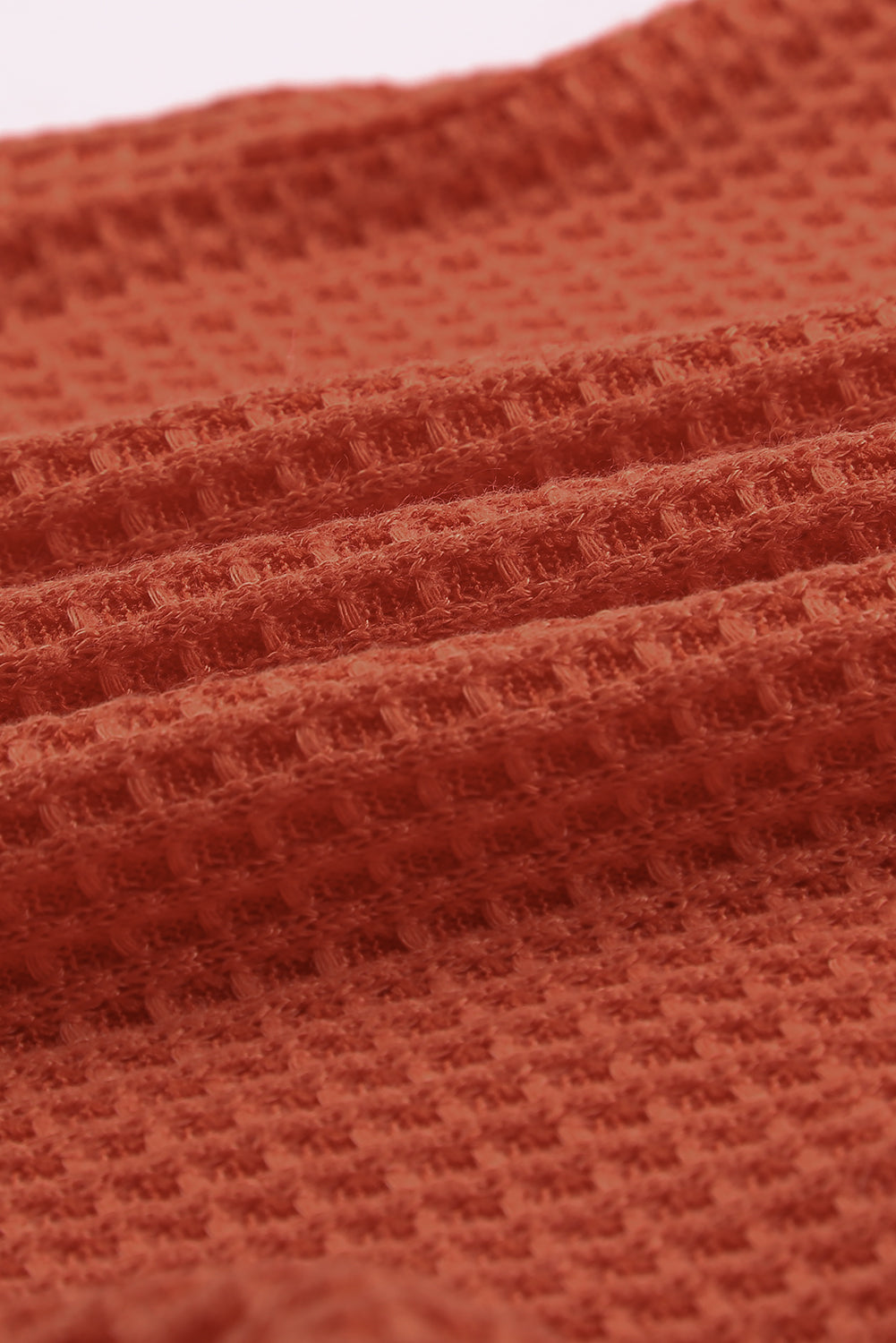 Haut en tricot thermique orange à œillets contrastés