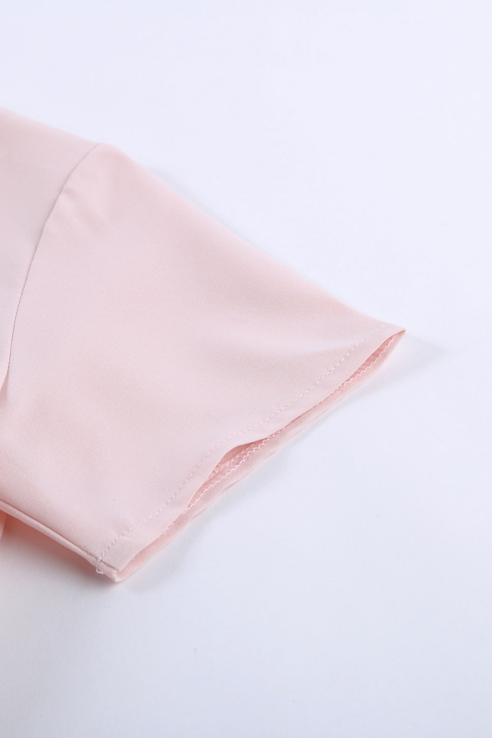 Barboteuse rose à basque et ceinture avec trou de serrure dans le dos pour filles