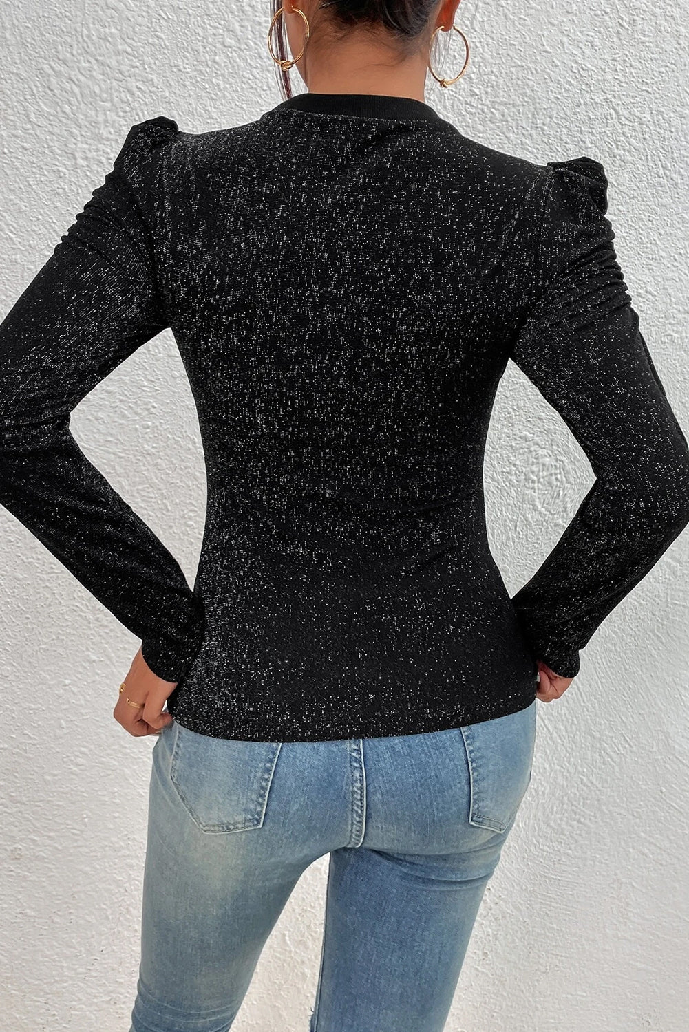 Haut slim noir en tricot métallisé à manches Gigot