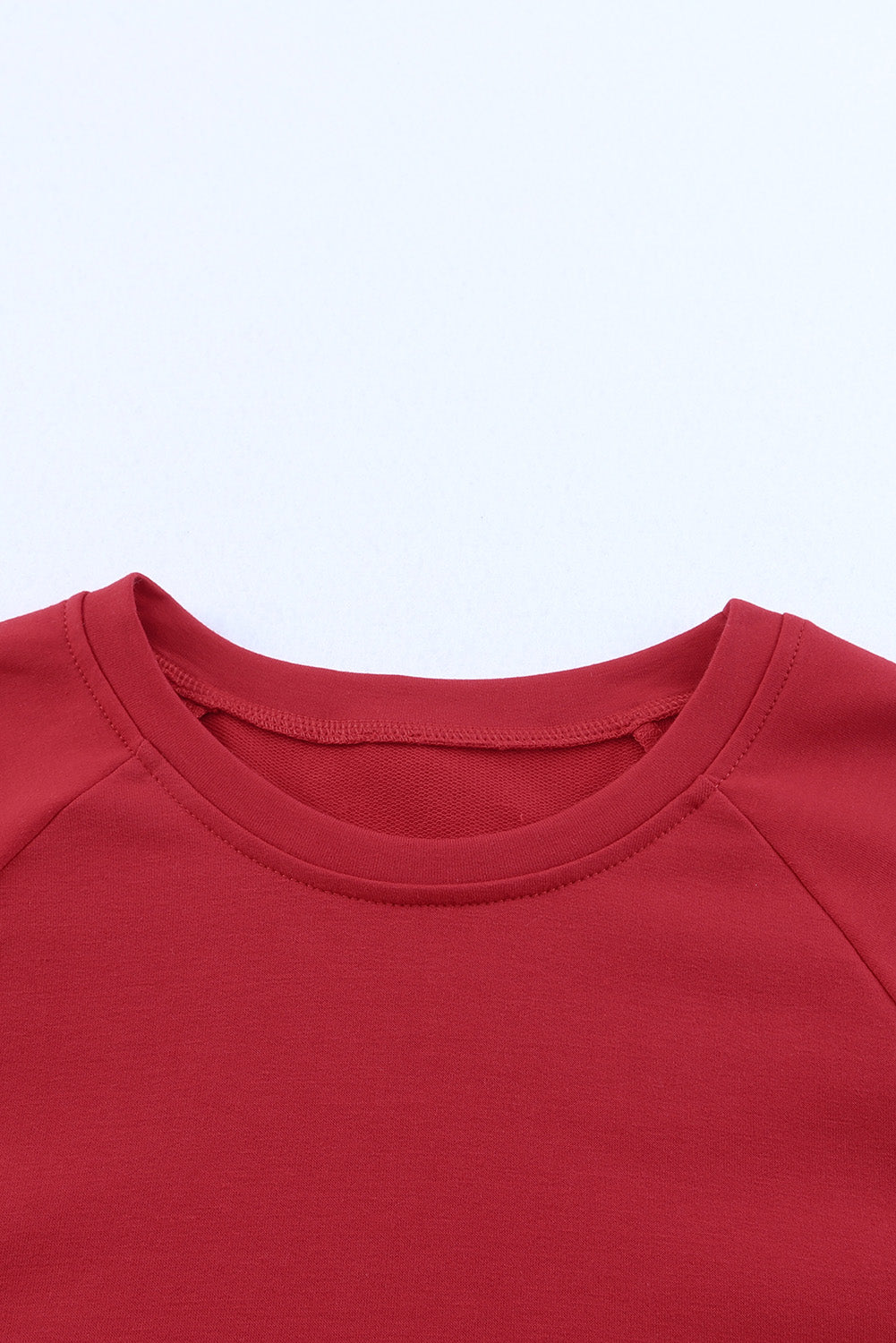 Sweat-shirt à manches raglan et col rond uni rouge vif