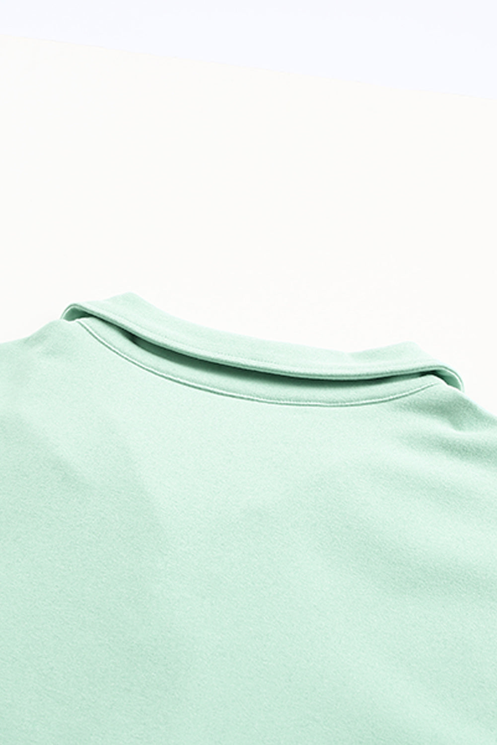 Grünes Pullover-Sweatshirt mit Reißverschluss vorne und Taschen