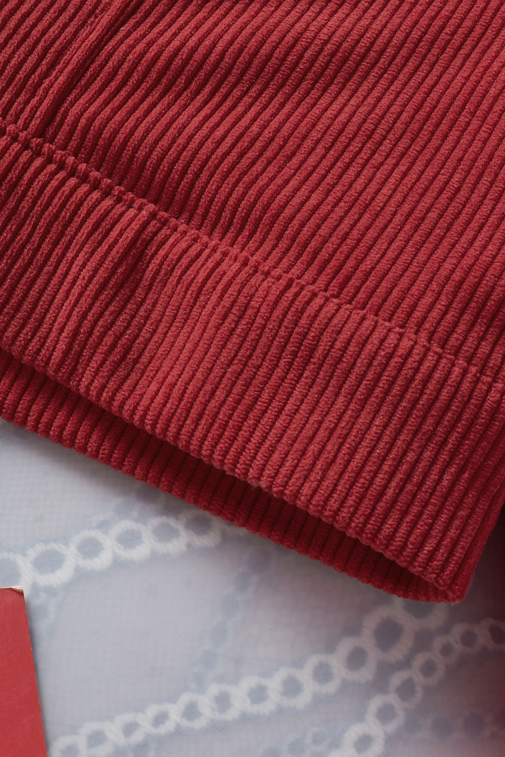 Feurig rote Cord-Sherpa-Jacke mit Druckknopf-Klappe