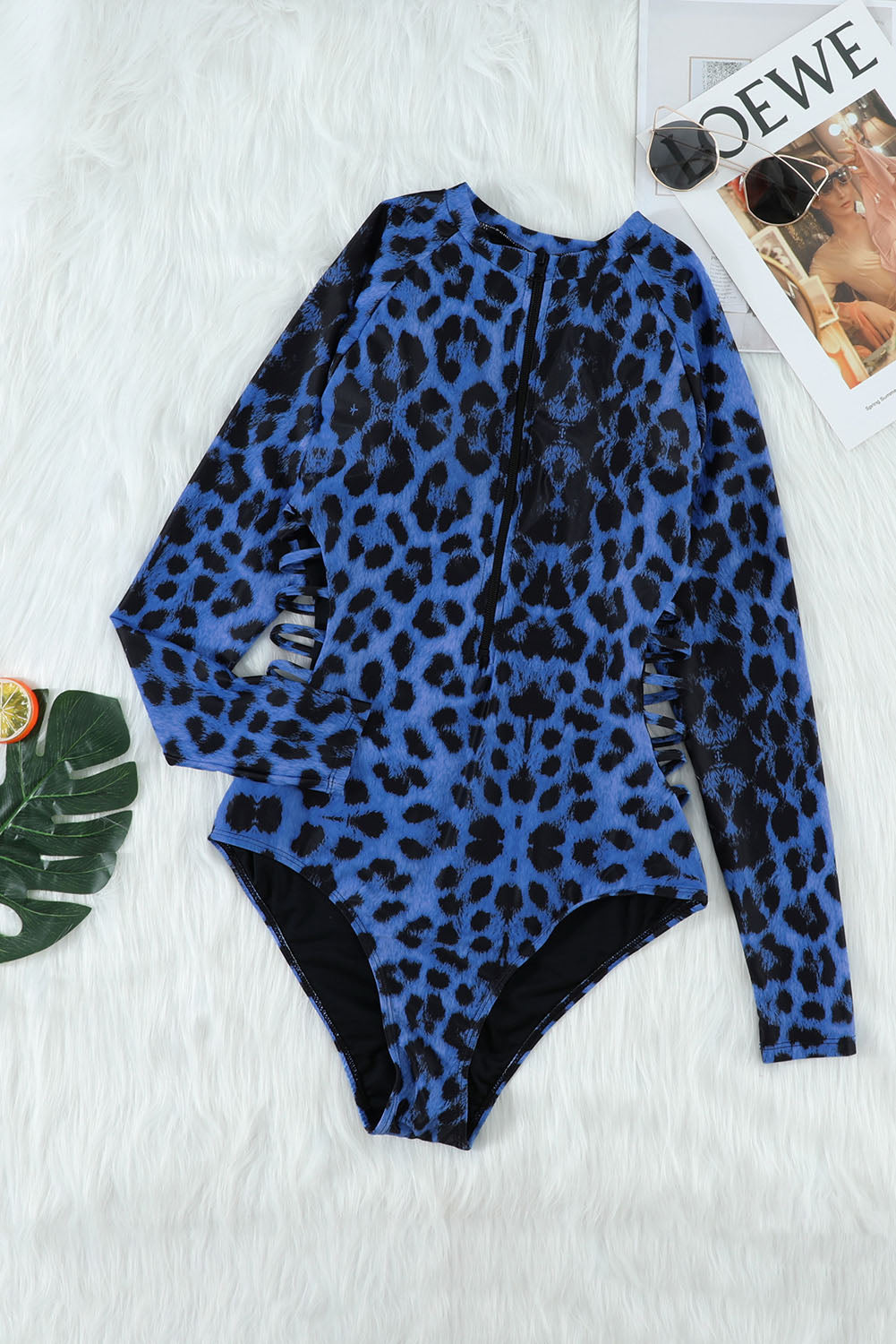 Blauer Rashguard-Badeanzug mit Leopardenmuster und Reißverschlussausschnitt