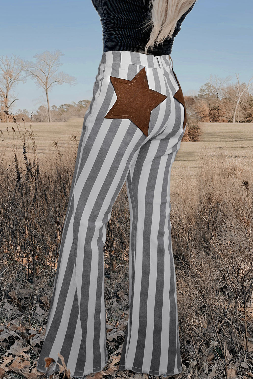 Jeans svasati western decorati con stelle a righe
