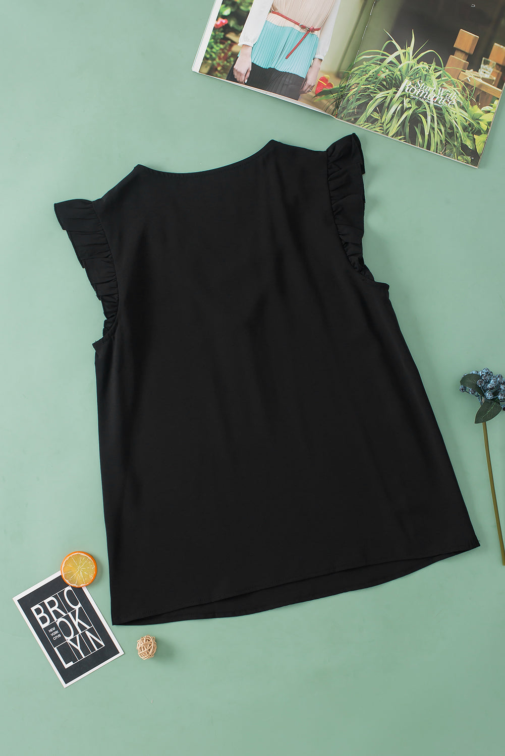 Schwarze Bluse mit kontrastierenden Pailletten, V-Ausschnitt und Flatterärmeln