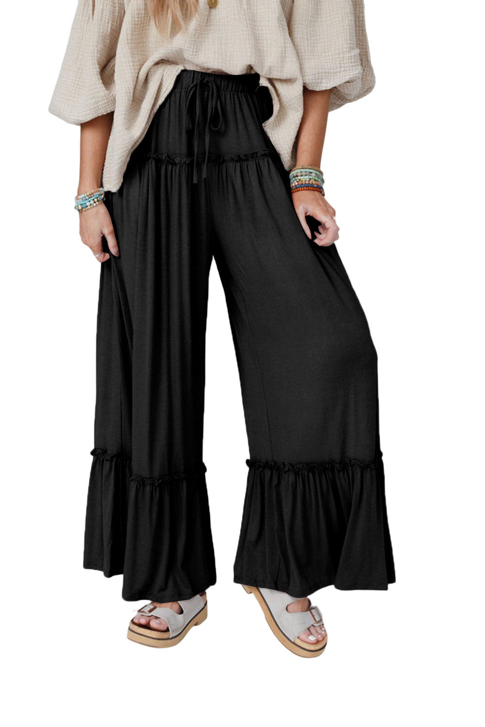 Pantalon large noir à taille haute et cordon de serrage à volants