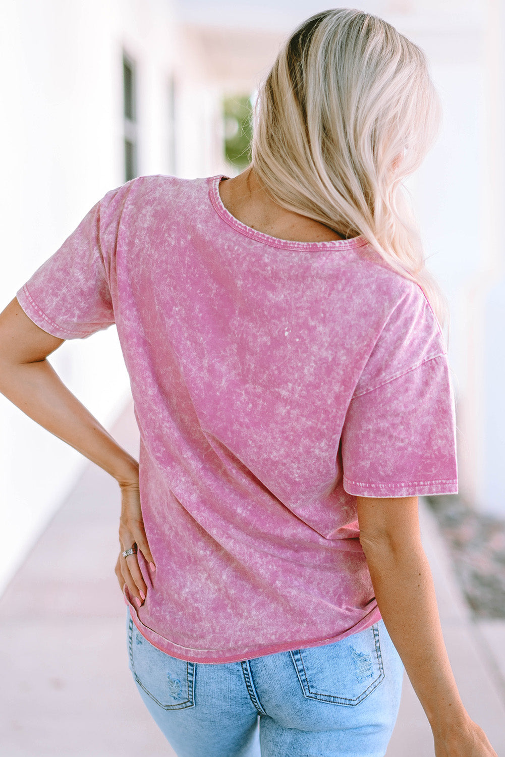 T-shirt graphique rose à imprimé d'étoiles vintage et délavé minéral